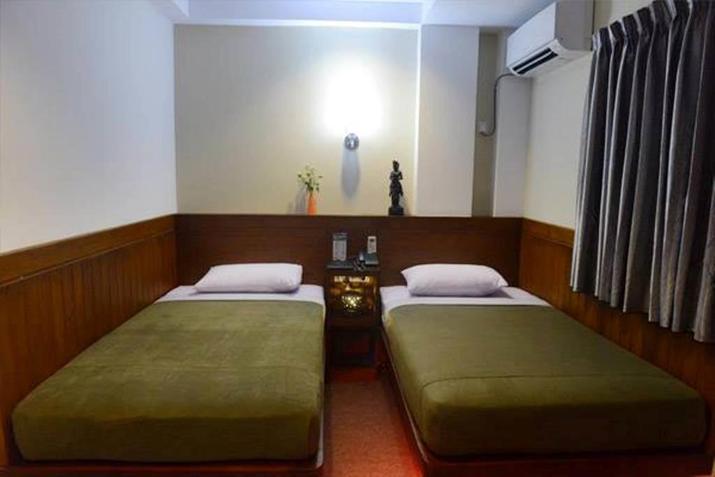 Green Paradise Hotel Yangon Phòng bức ảnh